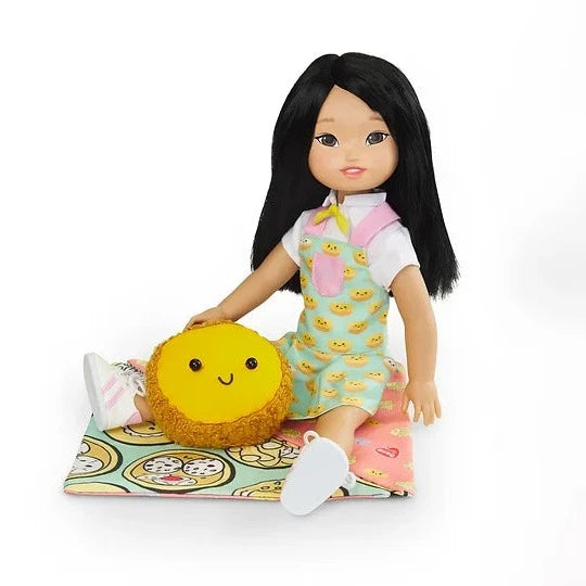 The Jilly Bing doll sitting down