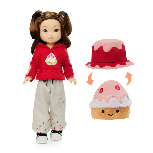 Jilly Bing’s Riley doll wearing a red hoodie next to reversible shaved ice bucket hat.