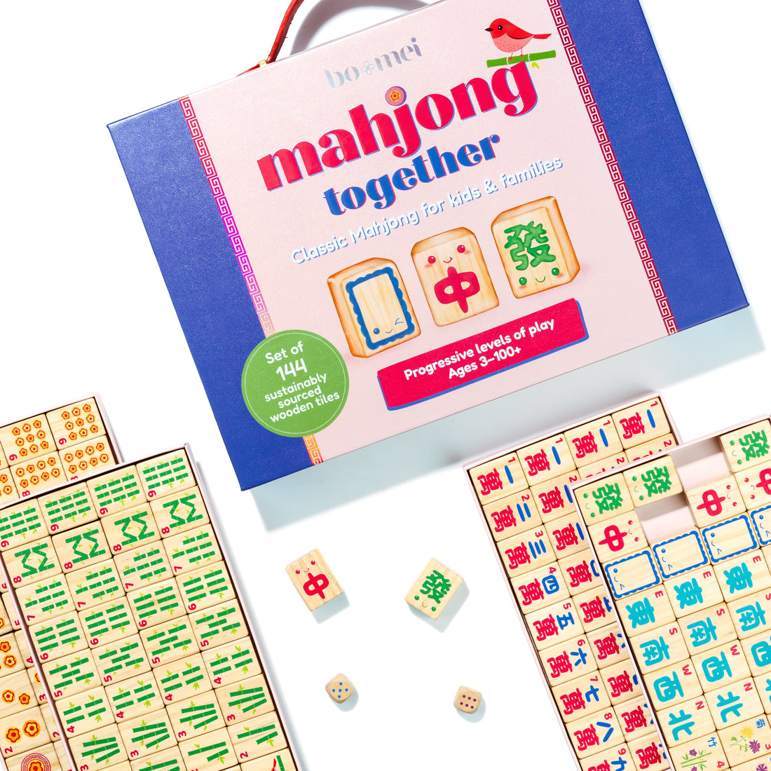 Mahjong Together family game set featuring a keepsake storage box, illustrated wooden mahjong tiles, and dice designed for kids and families learning mahjong together.